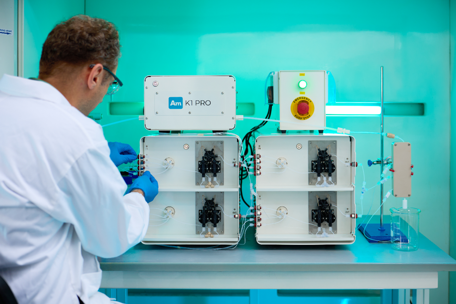 Man using a machine to do testing
